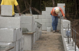 Block wall being constructed